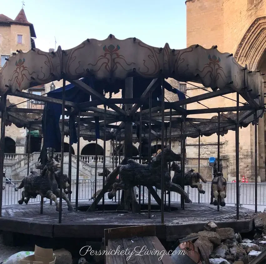 Carousel blackened by fire in All the light we cannot see