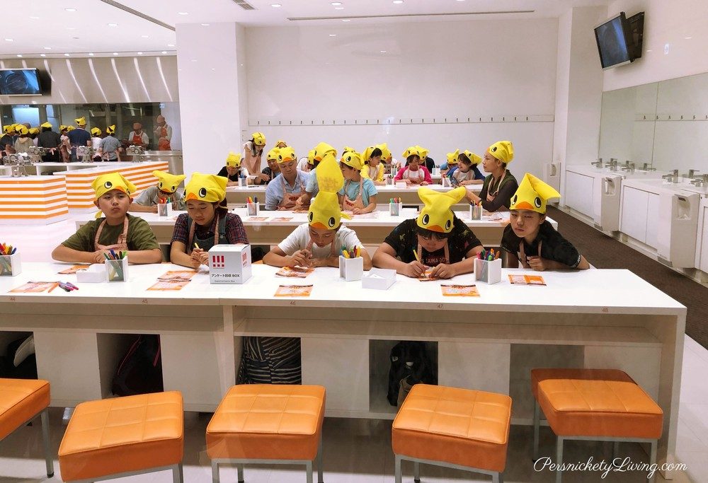 School kids in chicken hats at Chicken Ramen Factory
