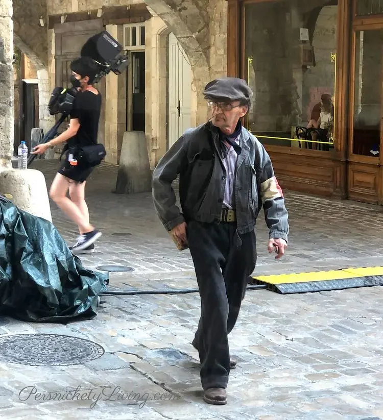 Man in 1940's costume with beret for all the light we cannot see