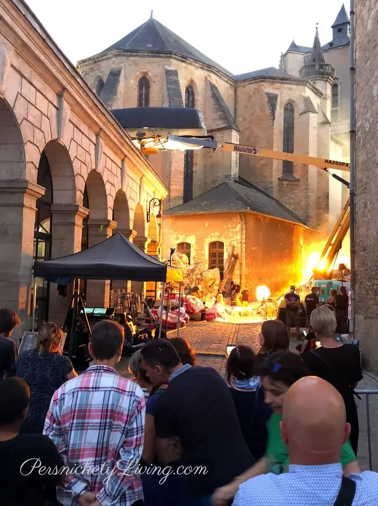 People watching filming with fire