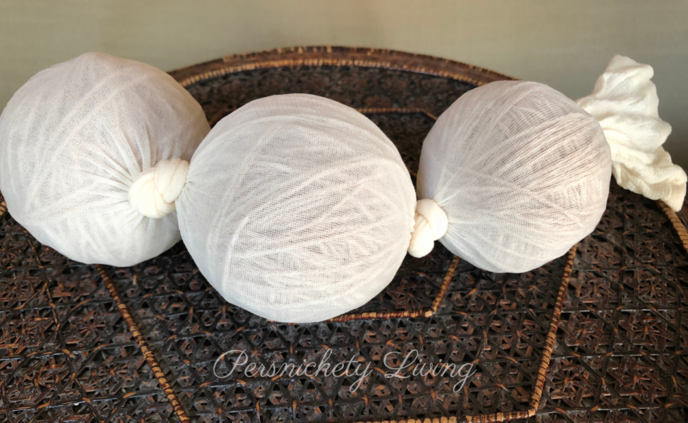 yarn balls tied in nylons ready for felting