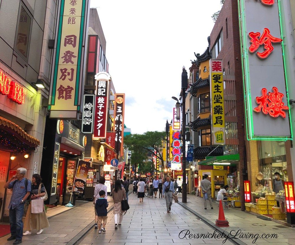 Chinatown street with people shope restaurants best things to do in yokohama