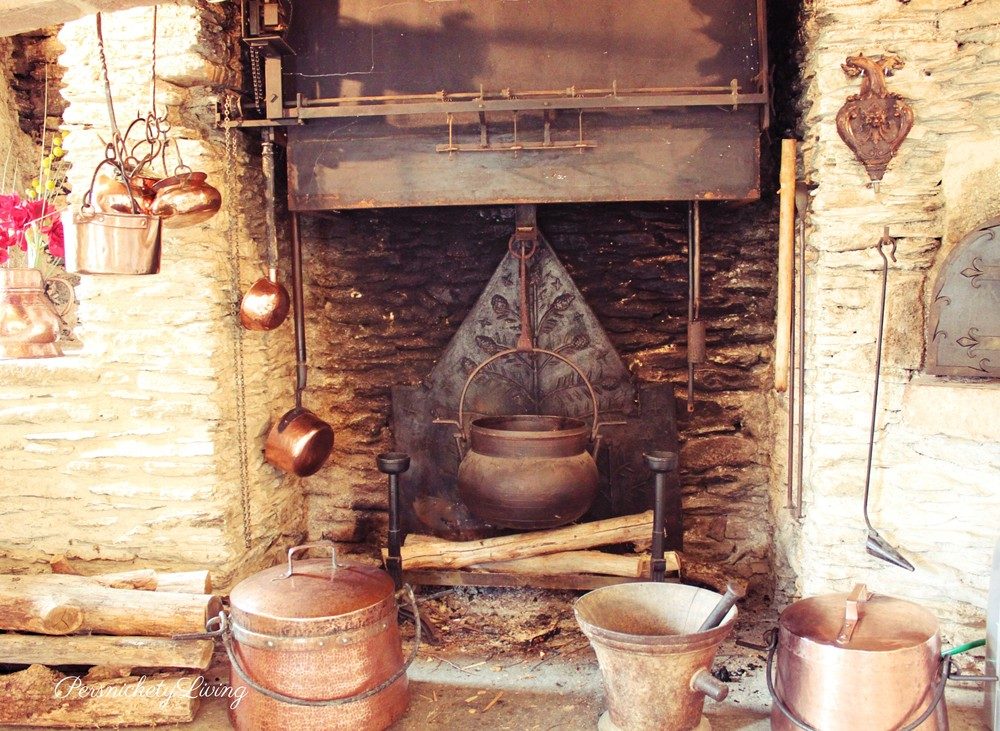 cooking fireplace with copper pots