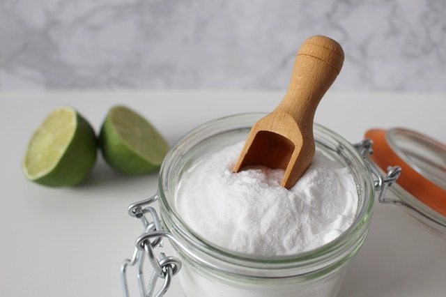 baking soda in a jar with scoop for laundry